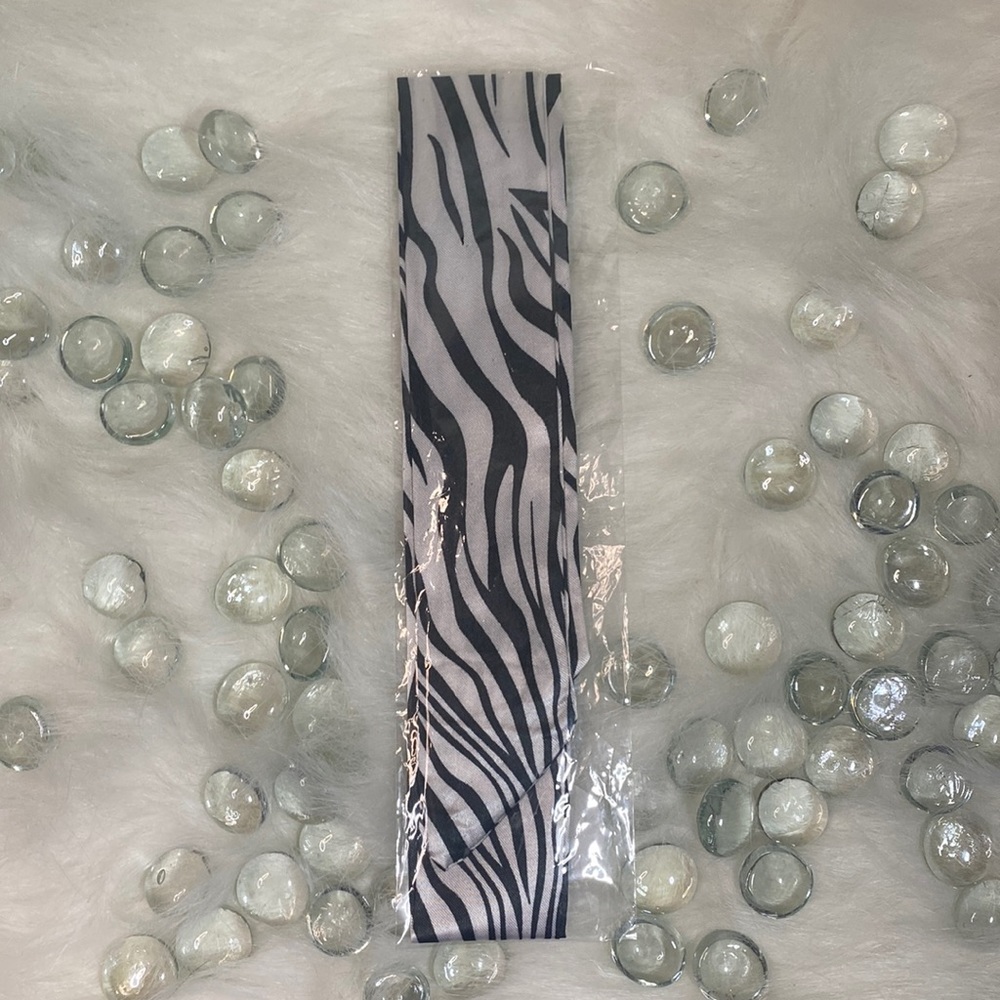 Handbag/ hair/ neck embellishment Animal print (NWOT)